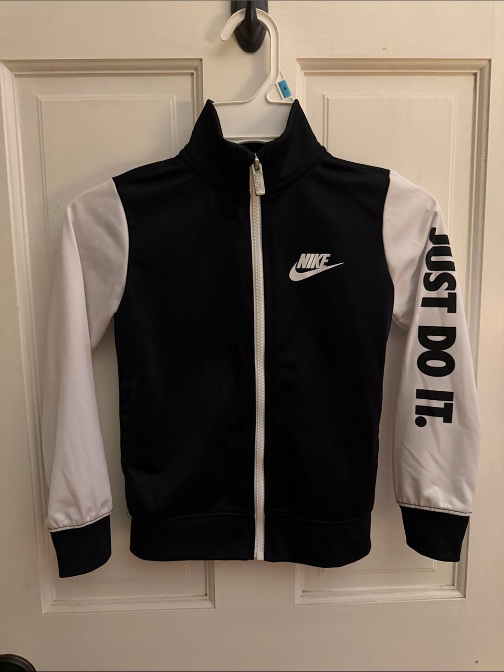 Nike Black & White Kids Zip-Up Track Jacket with 'Just Do It.' Sleeve